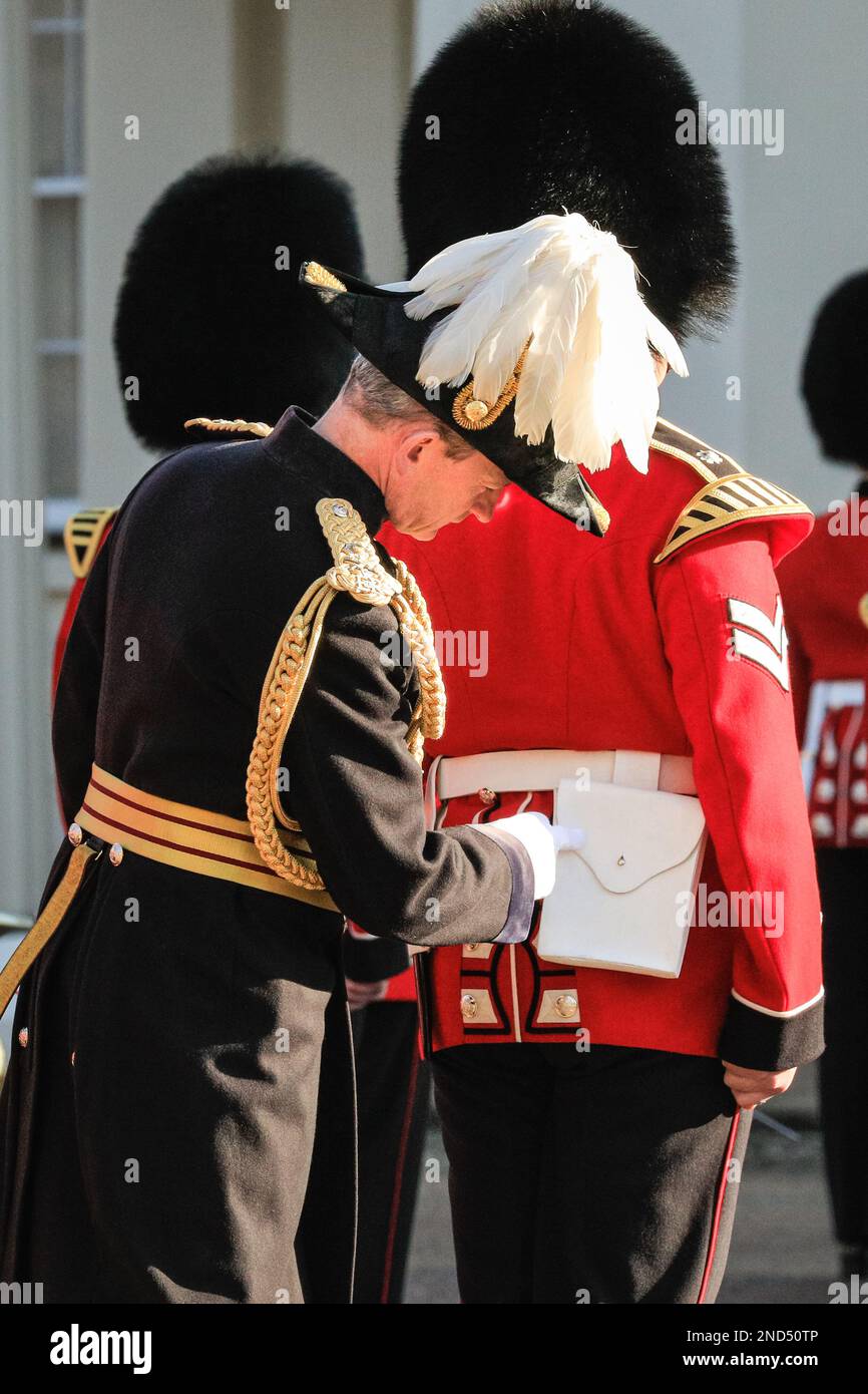 London, UK. 15th Feb, 2023. As Major-General commanding the Household Division commands, Major General Christopher Ghika CBE rigorously inspects the Foot Guards and Bands outside Wellington Barracks in Westminster this afternoon, to ensure they are fit for their duties. Credit: Imageplotter/Alamy Live News Stock Photo