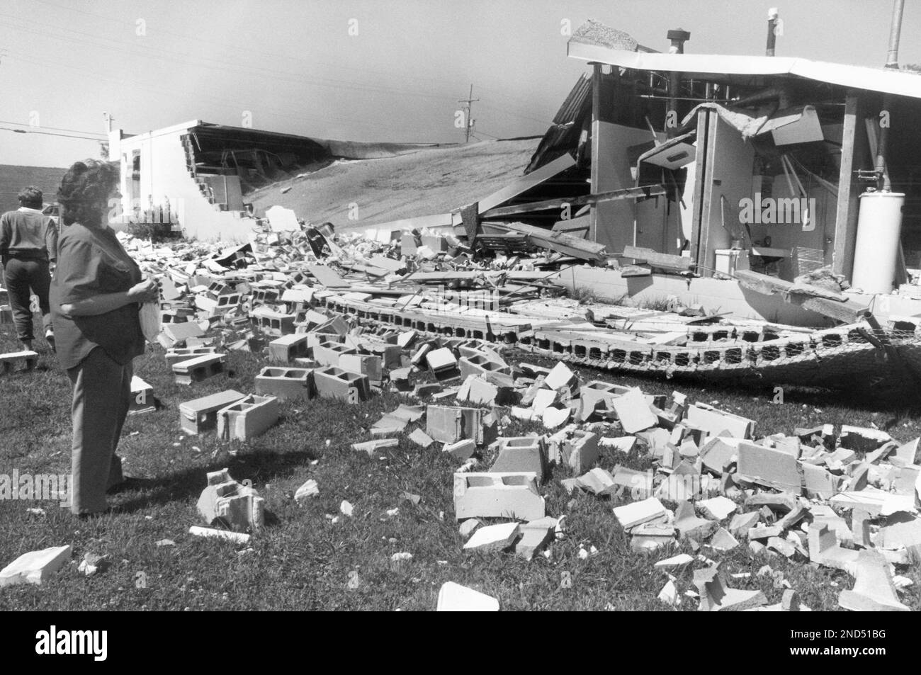 Gloria Estilette, manager of Bill's Dollar Store surveys her wipedout