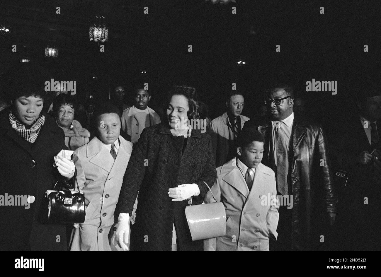 Coretta Scott King , widow of the slain civil rights leader, is flanked ...