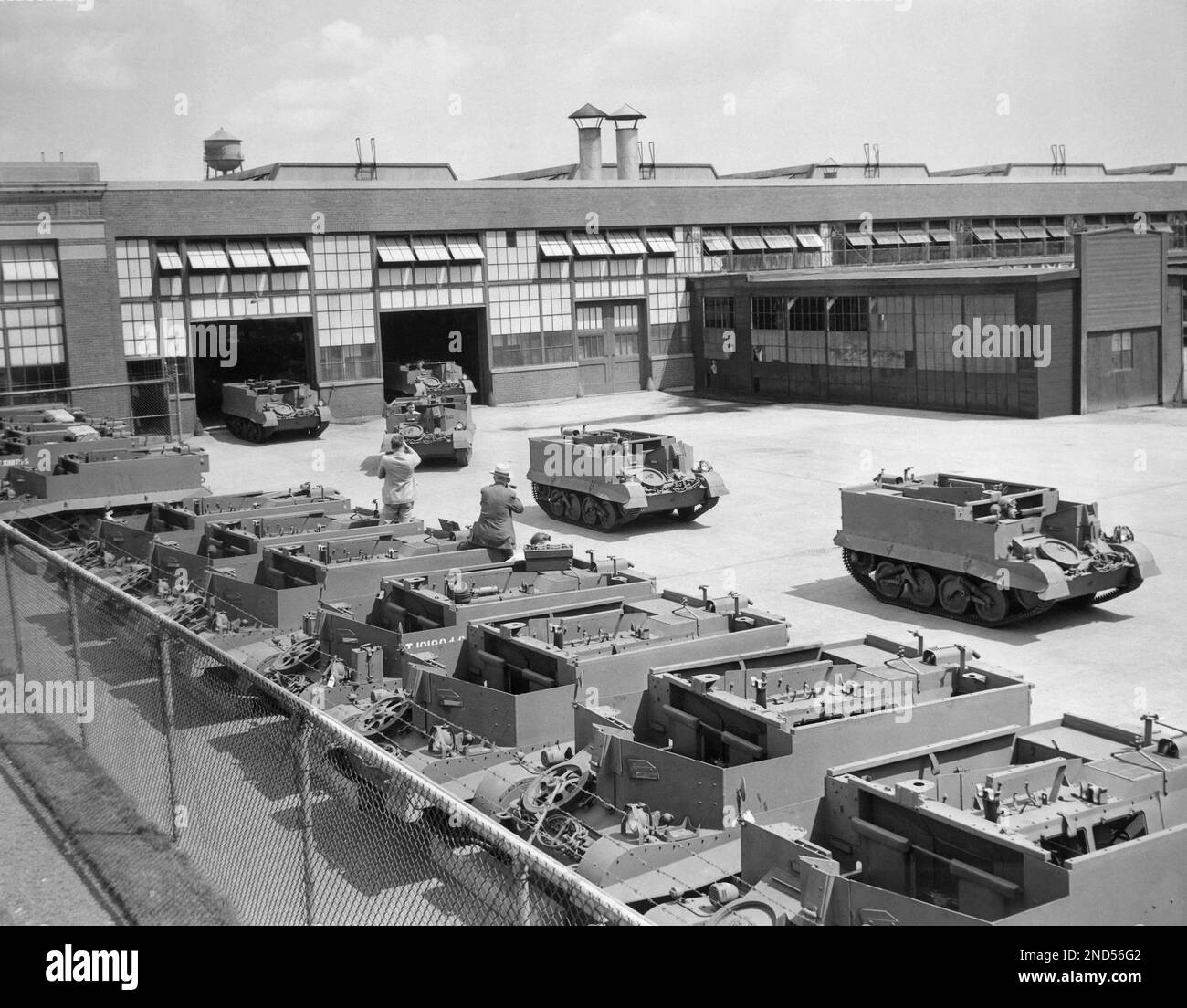 Universal Carriers, light armored machines designed to carry machine