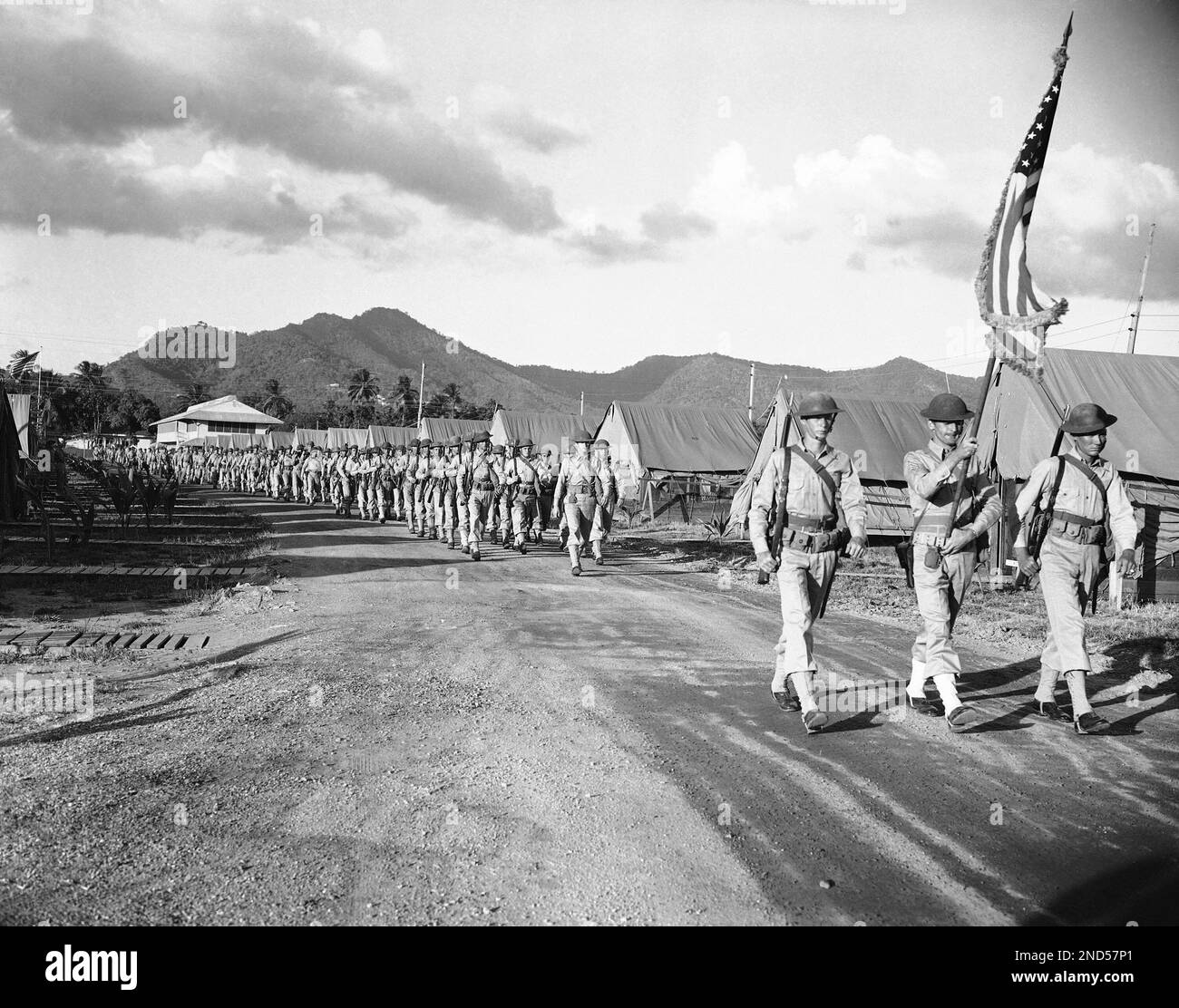 These American soldiers march down a company street in the U.S. Army ...