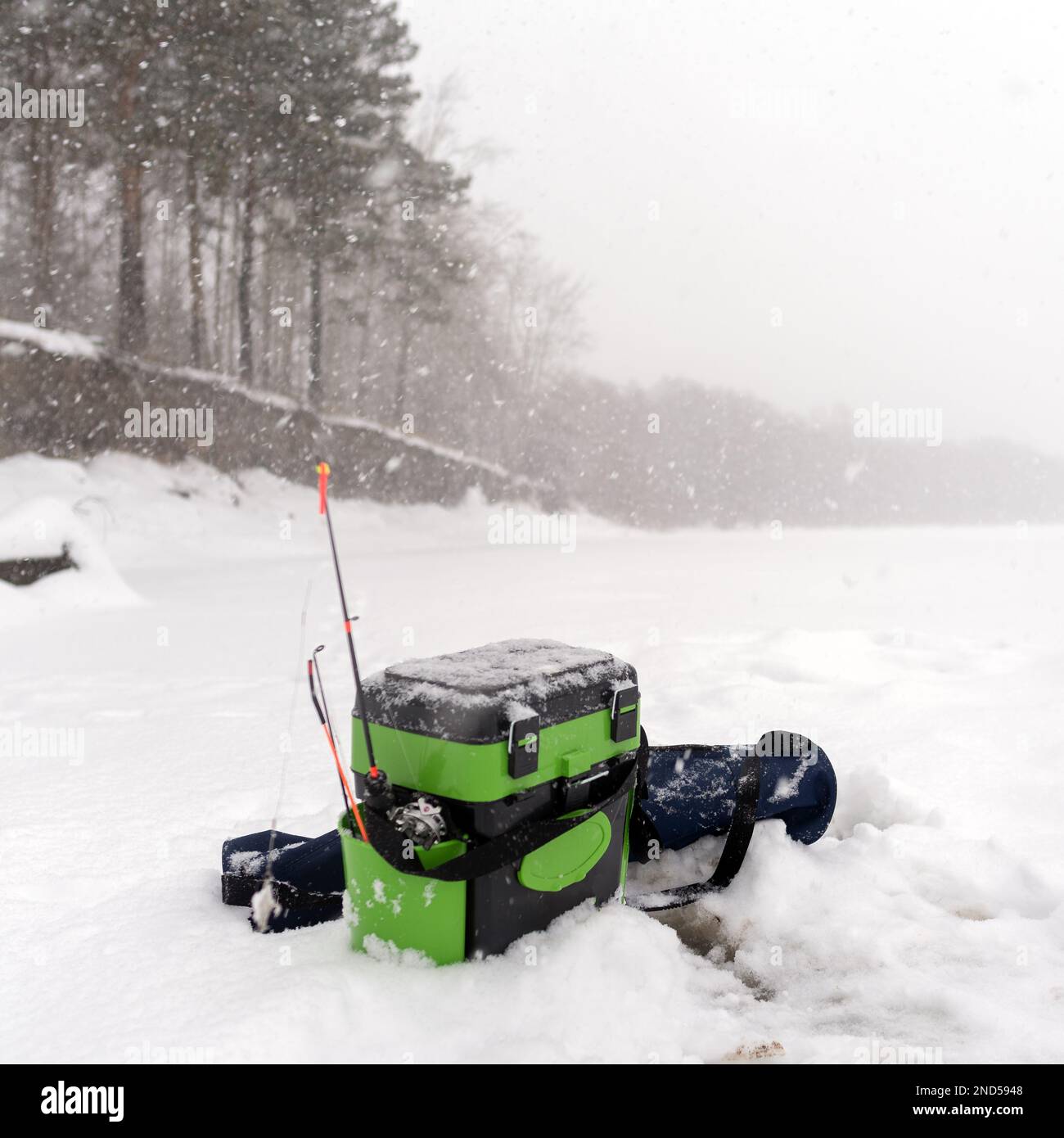 Fishing reel ice fishing rod for fishing spinners sticking out of the