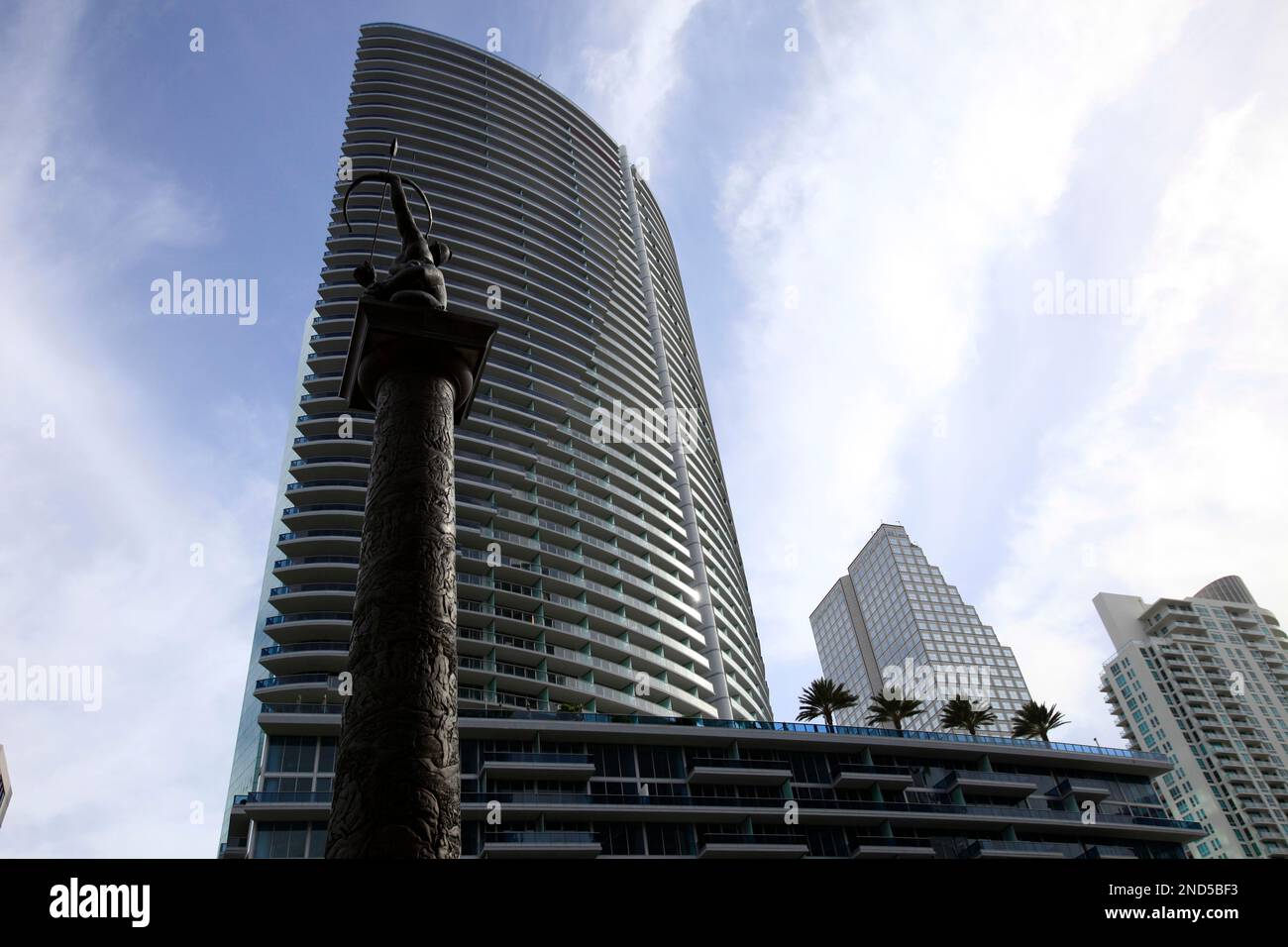 A statue depicting the Tequesta Indians is shown on the Miami River in