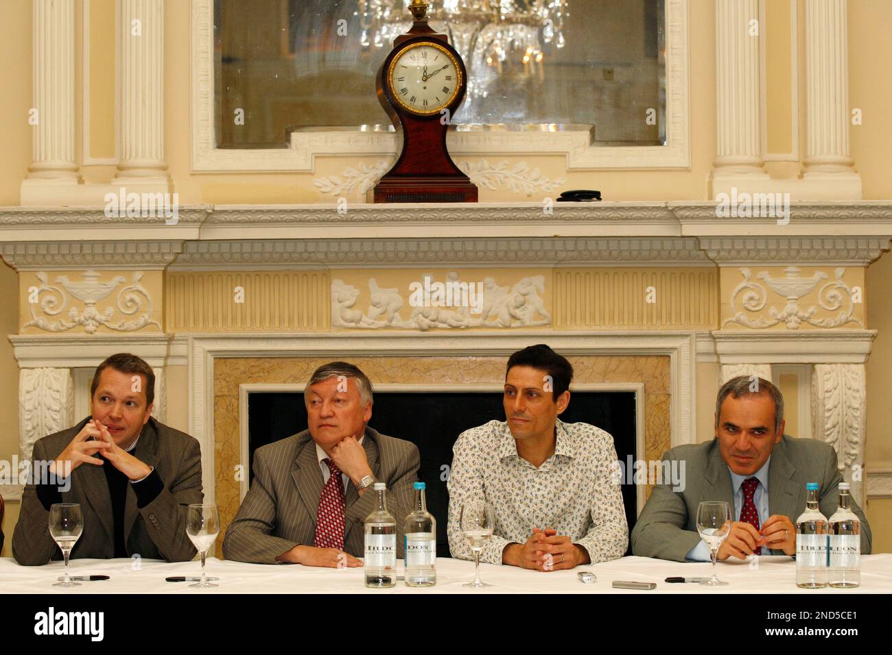 FIDE presidential candidate and former World Chess Champion, Anatoly  Karpov, second left, former World Chess Champion, Garry Kasparov, right,  President of English Chess Federation, CJ de Mooi, second right, and  British Chess