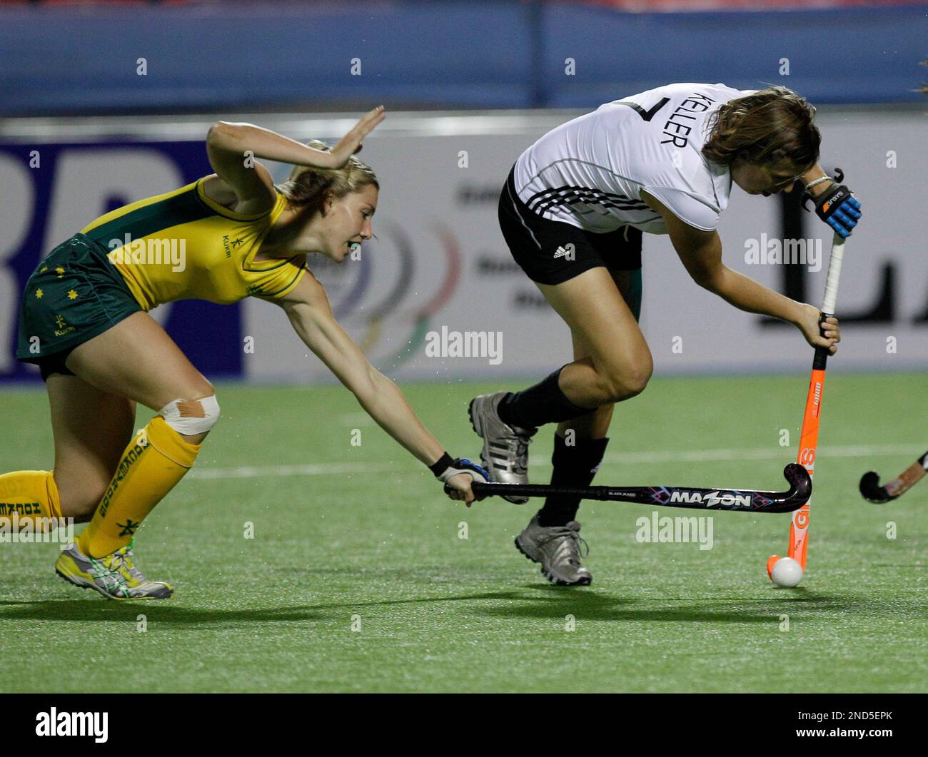 Australia's Casey Eastham, left, battles for the ball with Germany's