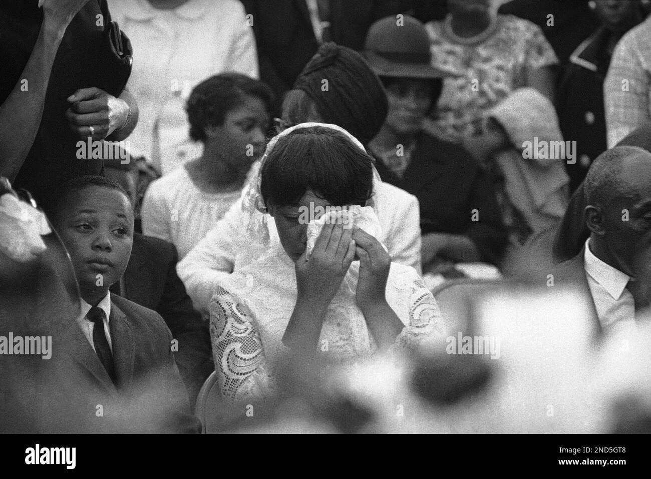 Yolanda King wipes her eyes as her father, Dr. Martin Luther King Jr