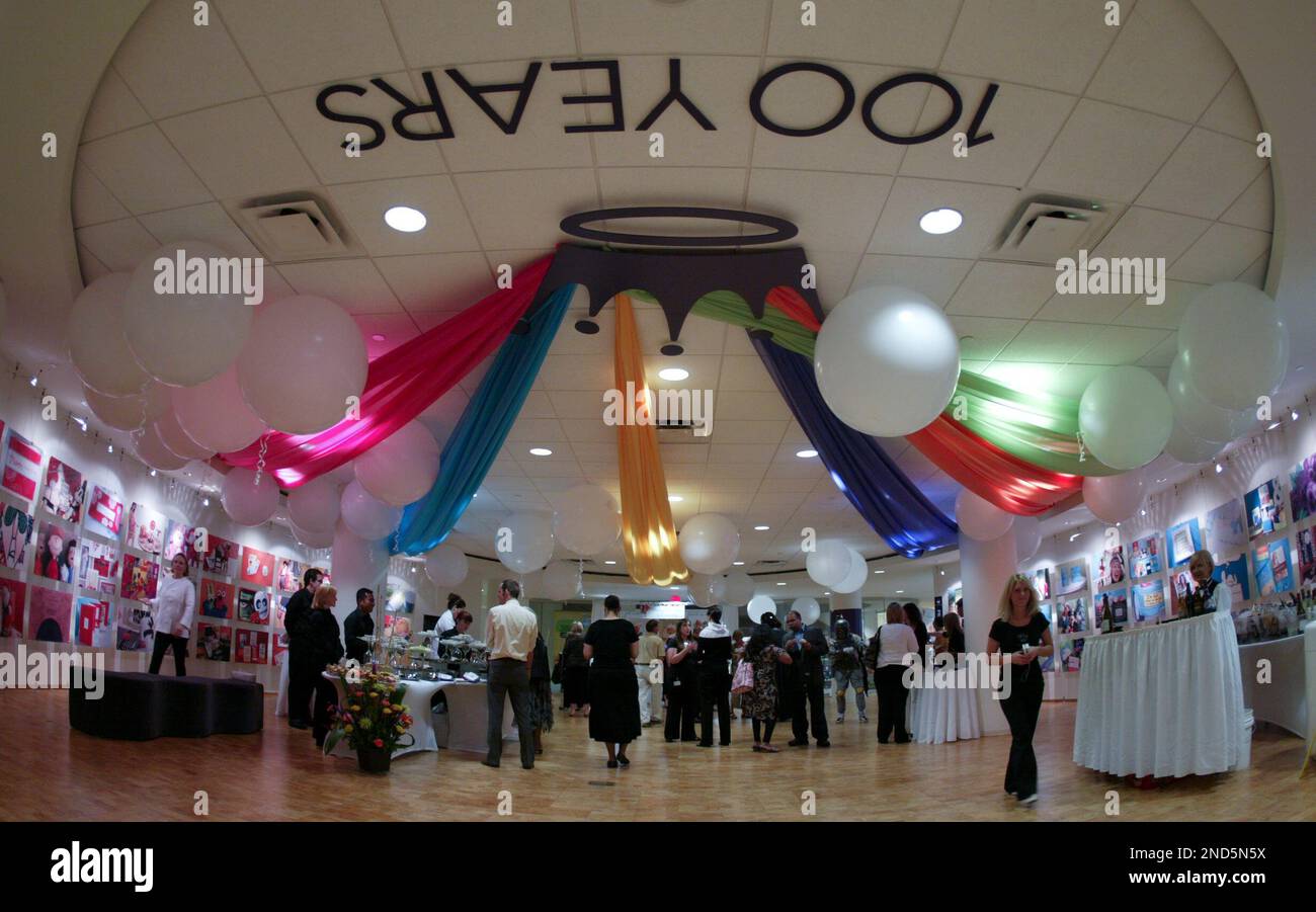 Guest walk the halls of Hallmark Cards Inc. headquarters as they attend