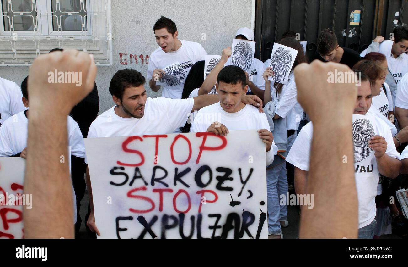 Roma rights activists during a protest in front of the French embassy ...