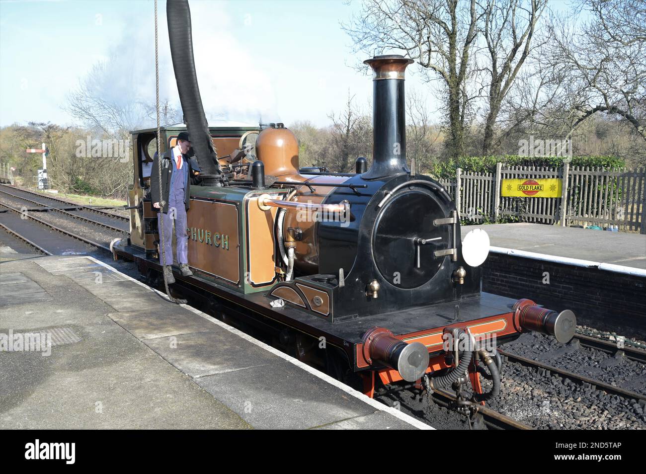 Fenchurch a Terrier locomotive taking water at Sheffield Park station. Stock Photo