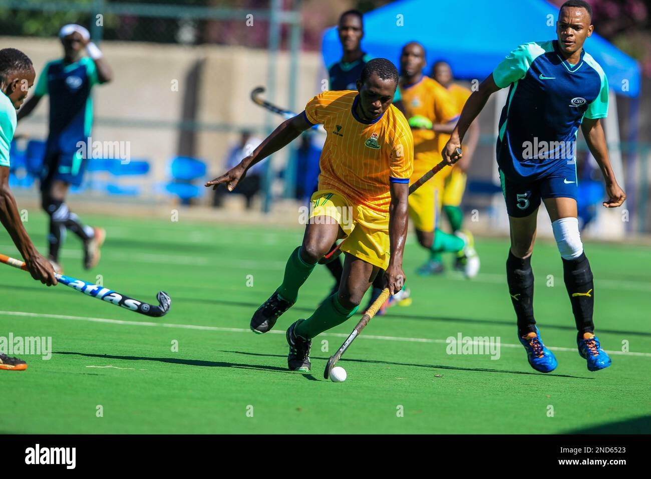 Nigeria Police Ajibua Oluwaseun dribbles past Khalsa Moshi James Paulo