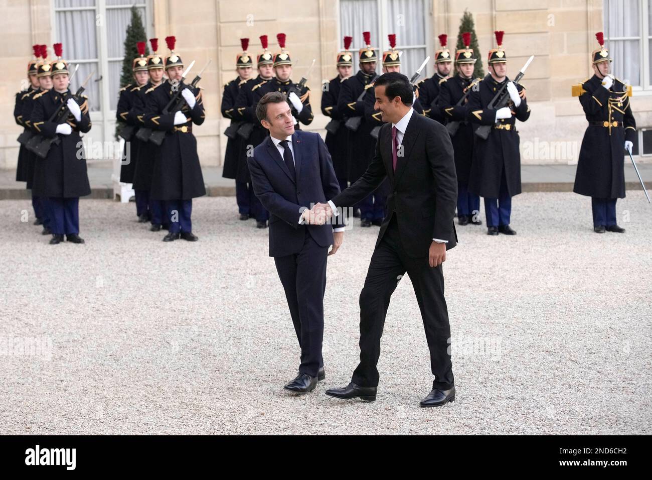 French President Emmanuel Macron, Left, Greets The Emir Of Qatar Sheikh ...