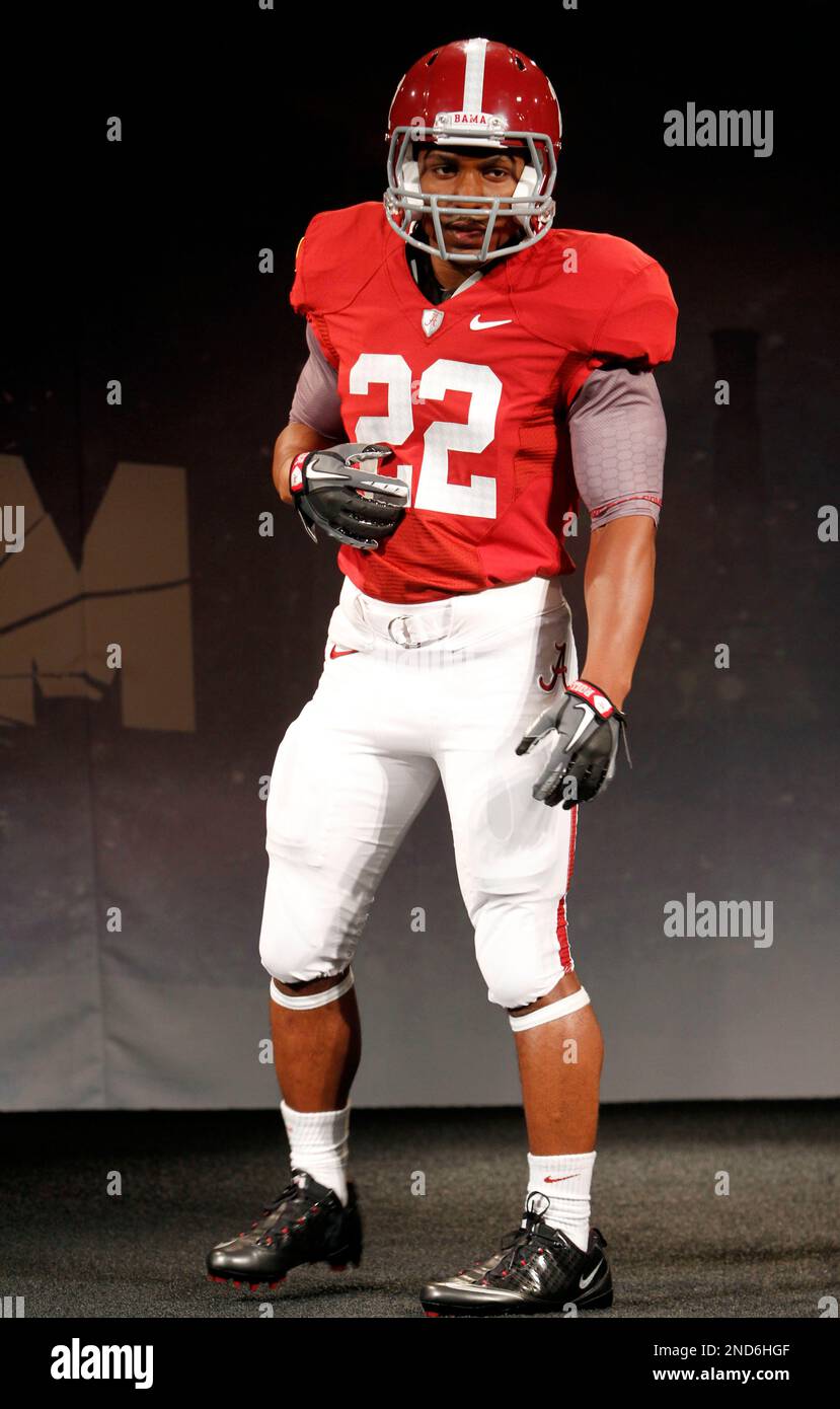 A model wears the new University of Alabama Nike football uniform,  Wednesday, Sept. 1, 2010 in New York. Nike unveiled the uniquely designed  Nike Pro Combat System of Dress uniforms that ten