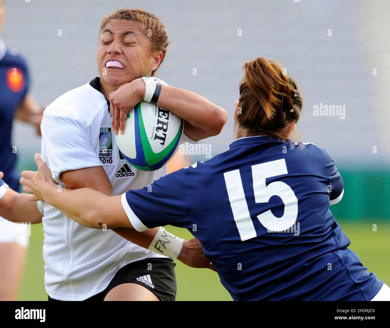 New Zealand's Renee Wickliffe, left, is tackled by France's Elodie