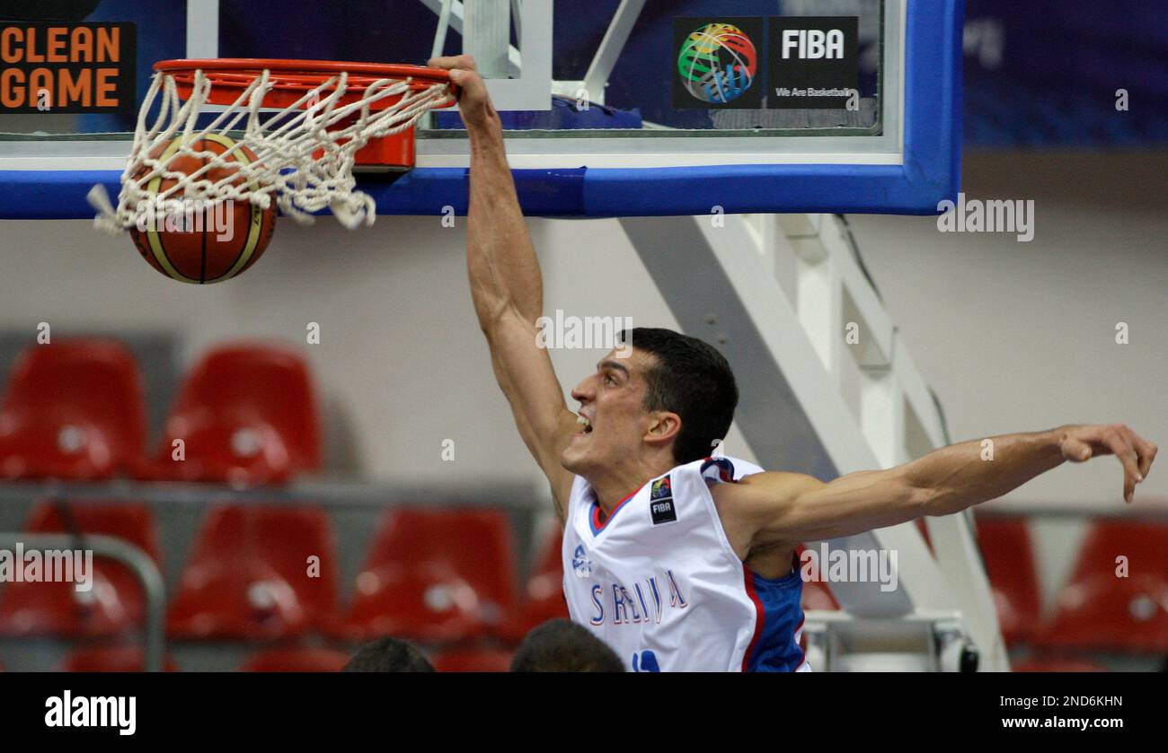 Marko Keselj from Serbia dunks the ball during the World Basketball  Championship preliminary round match against Australia in Kayseri, Turkey,  Wednesday, Sept. 1, 2010. (AP Photo/Petr David Josek Stock Photo - Alamy