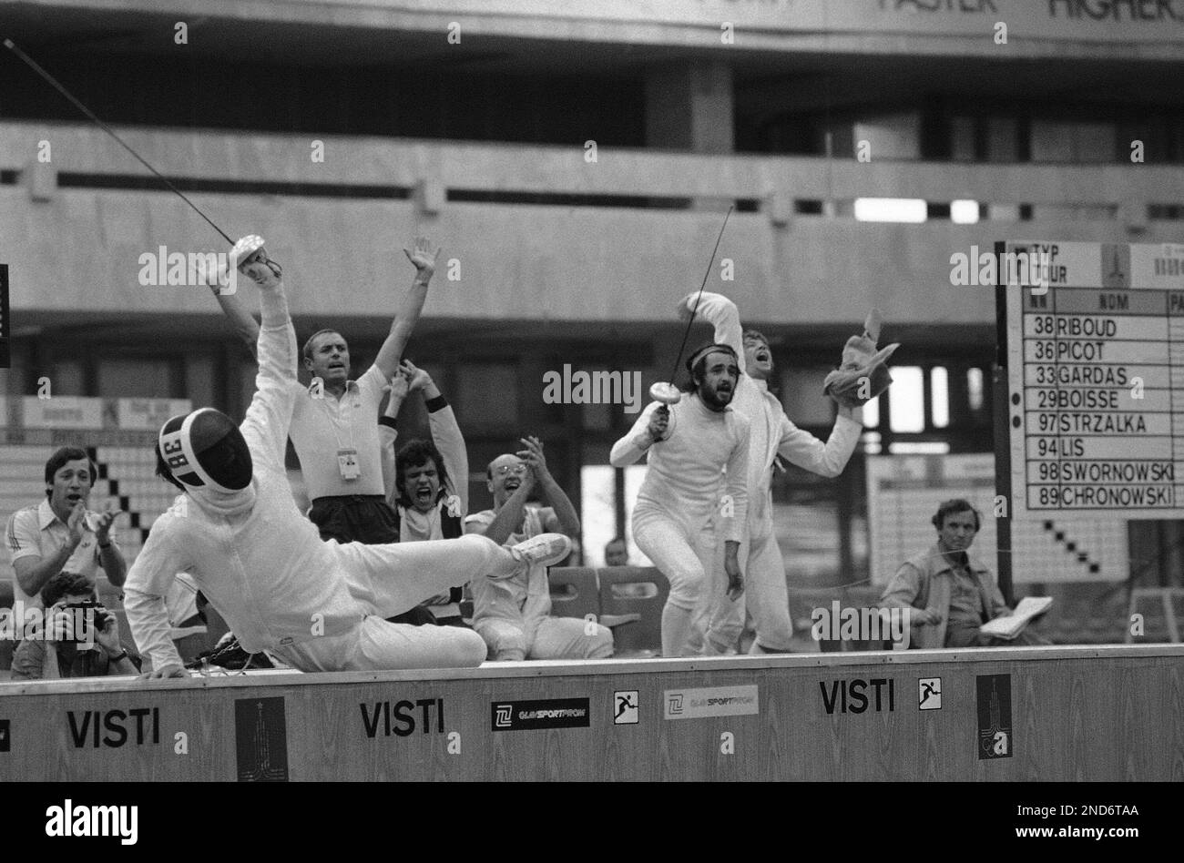 Philippe Riboud Philippe Riboud of France falls on the mat to the cheers of teammates ...