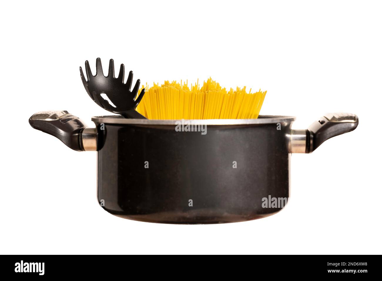 pan of spaghetti, special spoon fork skimmer for spaghetti Stock Photo