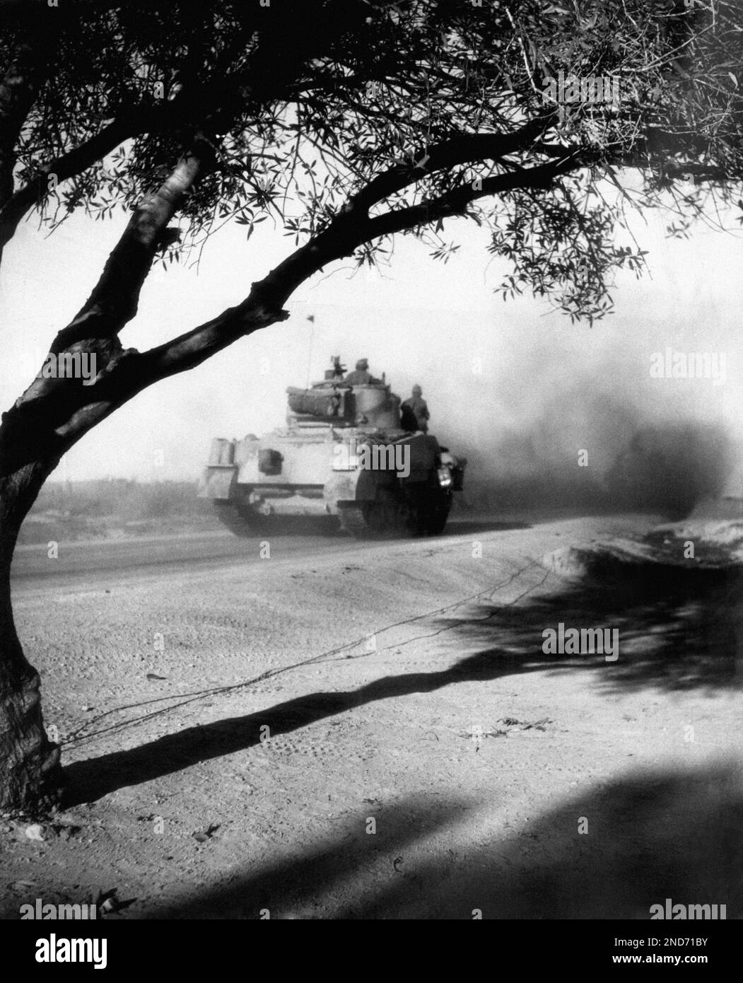One of a column of U.S.built tanks moves up toward Tunisia March 27