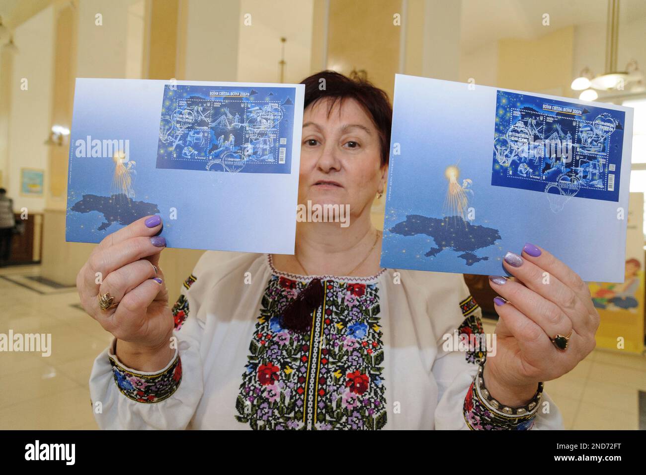 Lviv, Ukraine 15 February 2023. Ukrposhta launched a new stamp dedicated to utility workers who restore critical infrastructure after enemy missile attacks, it is called 'Warriors of Light. Warriors of Good'. Russia invaded Ukraine on February 24, 2022, triggering the largest military attack in Europe since World War II Stock Photo