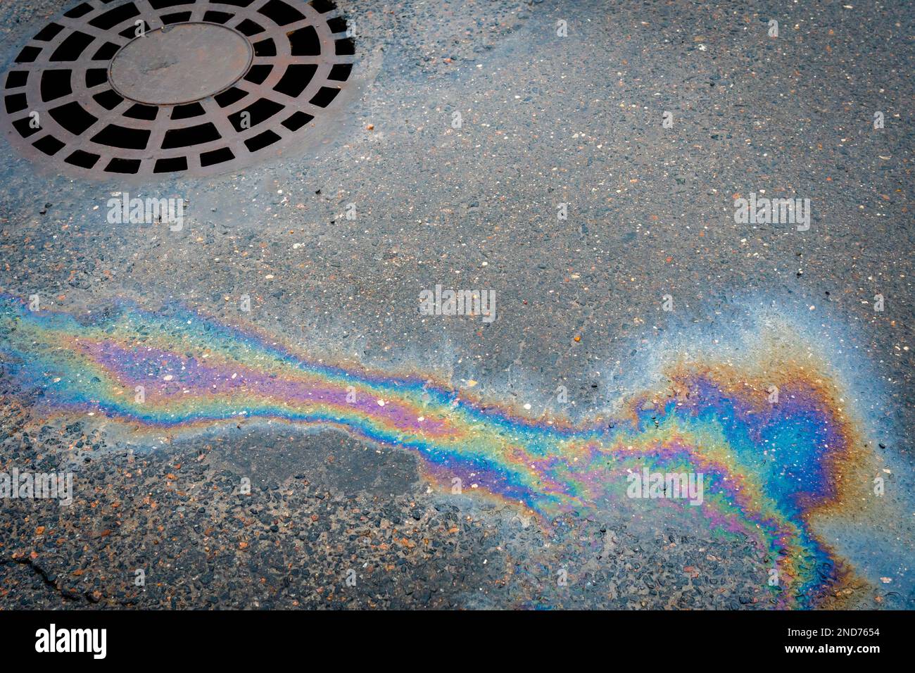 Waste from the oil industry flows down the storm drain with rainwater