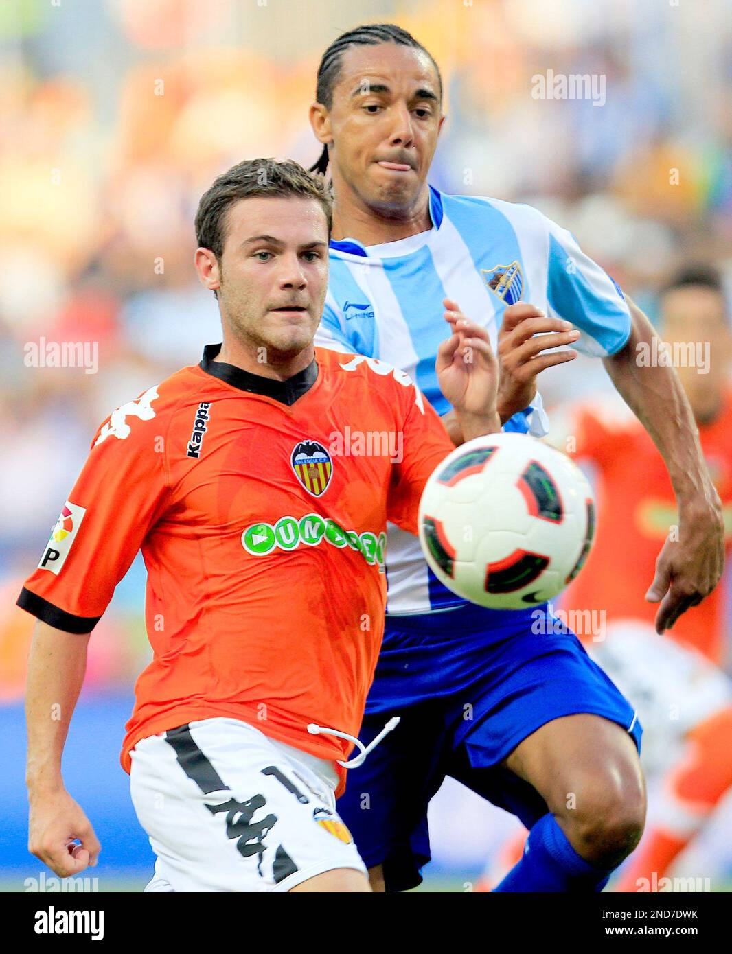 Malaga's Weligton Robson from Brazil, left, duels for the ball with Real  Madrid's Sami Khedira from Germany, right during their Spanish La Liga  soccer match at Rosaleda stadium in Malaga, Spain, Saturday,