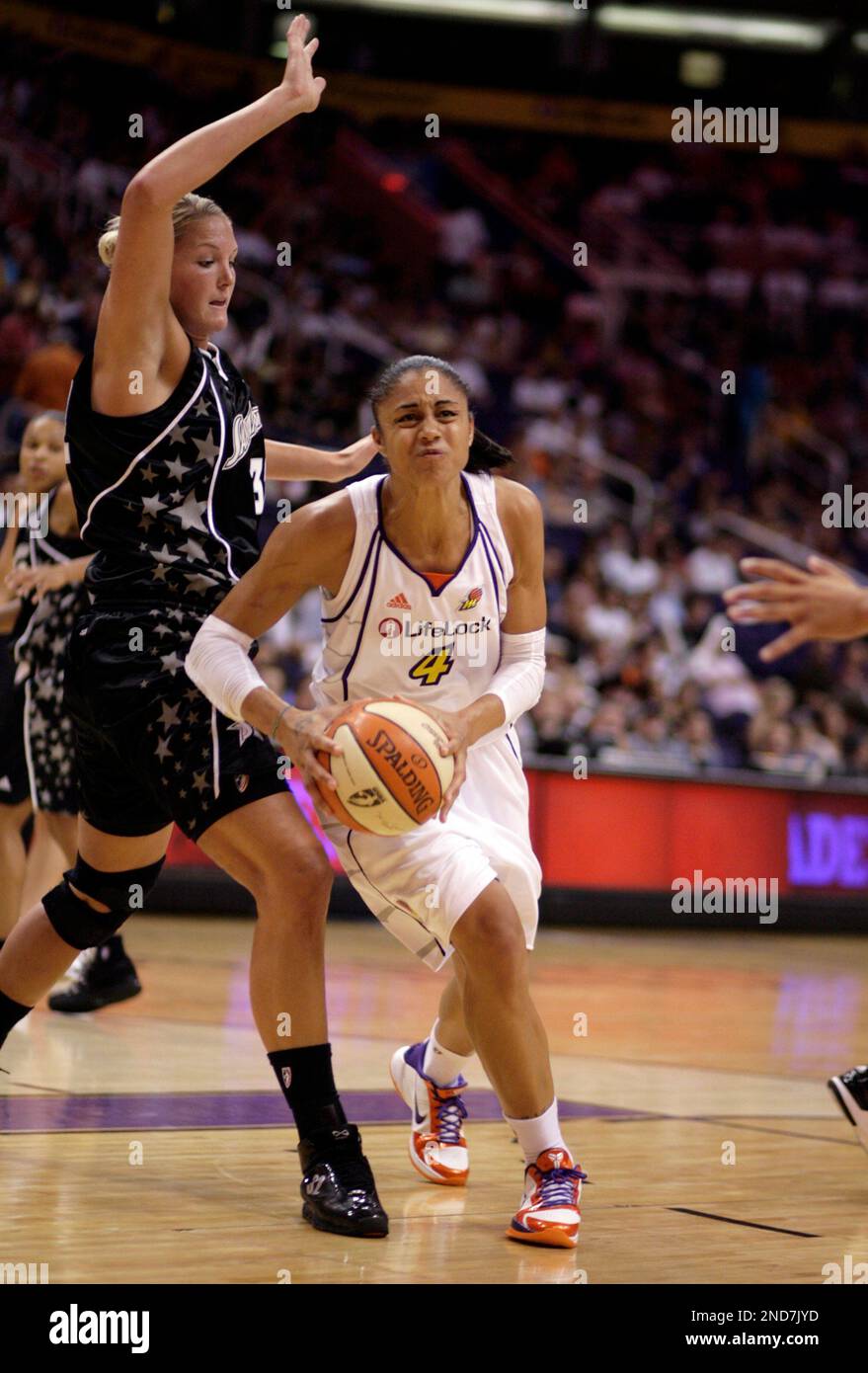 Phoenix Mercury's Candice Dupree, right, against San Antonio Silver