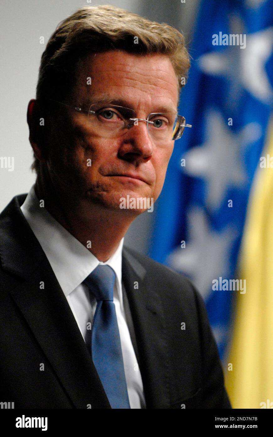 German Foreign Minister Guido Westerwelle attends a press conference with Bosnian Prime Minister Sven Alkalaj, not seen, in Sarajevo, Bosnia, Friday, Aug. 27, 2010. (AP Photo/Sulejman Omerbasic) Stock Photo