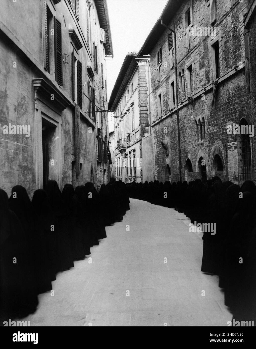 Nuns of the order of St. Clare walk in the procession through the ...