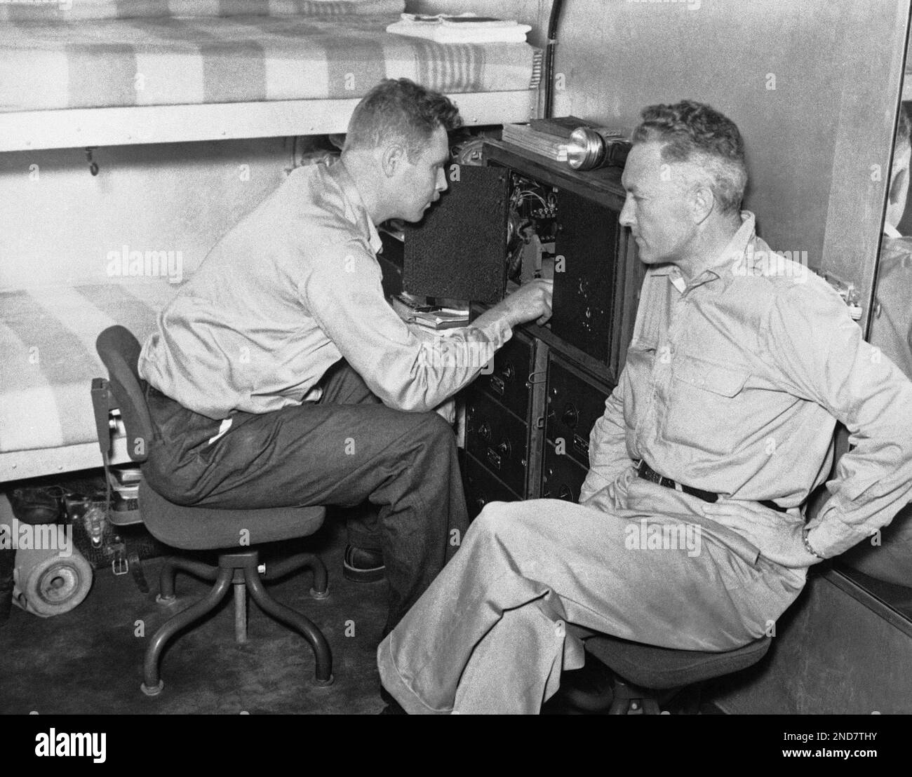 Rear Admiral Richard E. Byrd, right, and Alton F. Wade, senior scientist,  in the Antarctic in 1939. Wade is demonstrating the seismograph to Admiral  Byrd. (AP Photo Stock Photo - Alamy