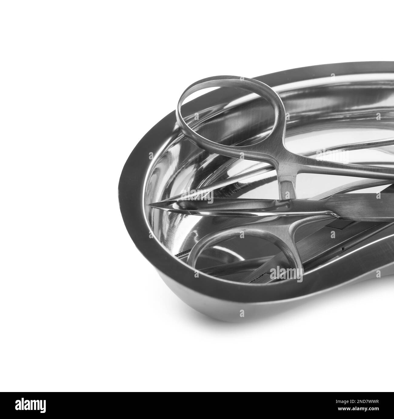Surgical instruments in kidney dish on white background Stock Photo Alamy