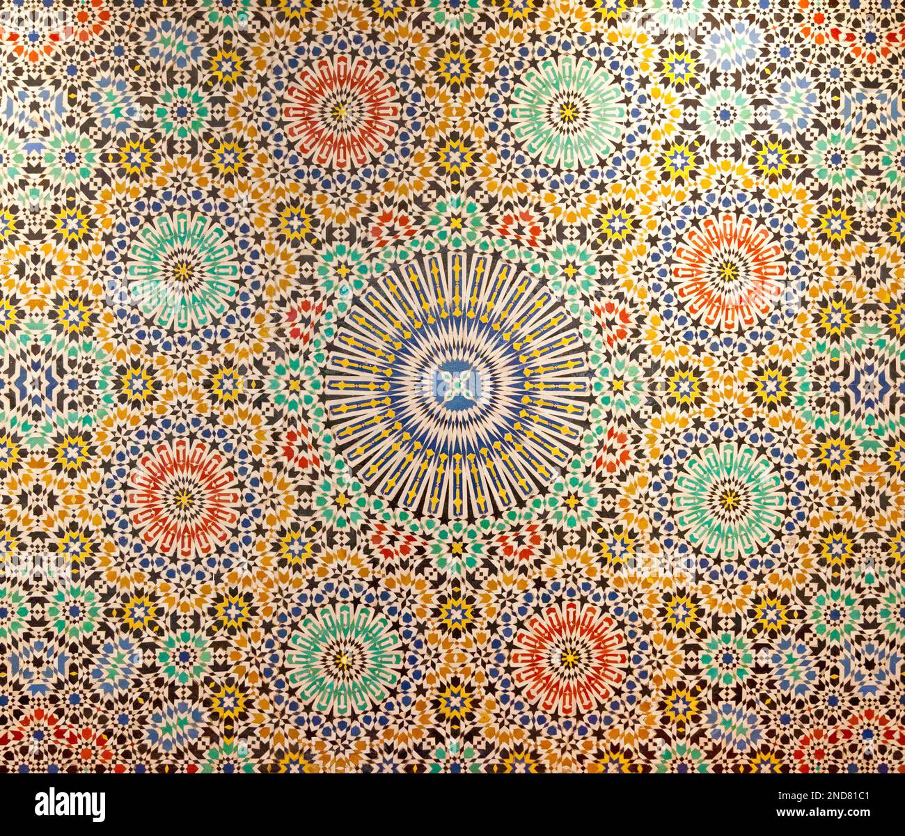 Close-up on a Moroccan geometric pattern in mosaic from Fez in Morocco. Stock Photo