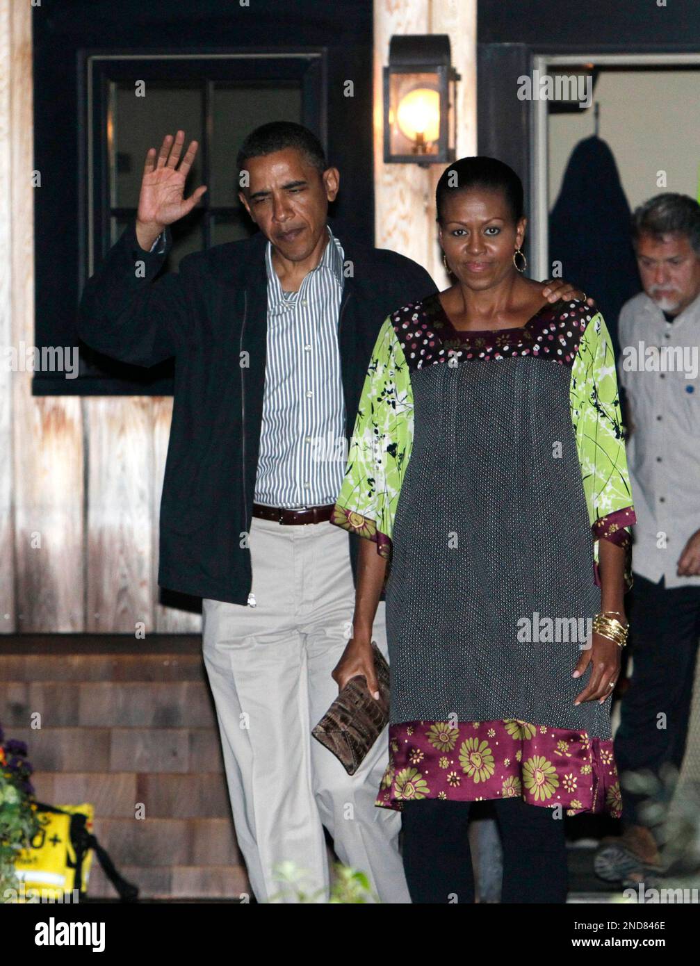 President barack obama and first lady michelle obama leave state road