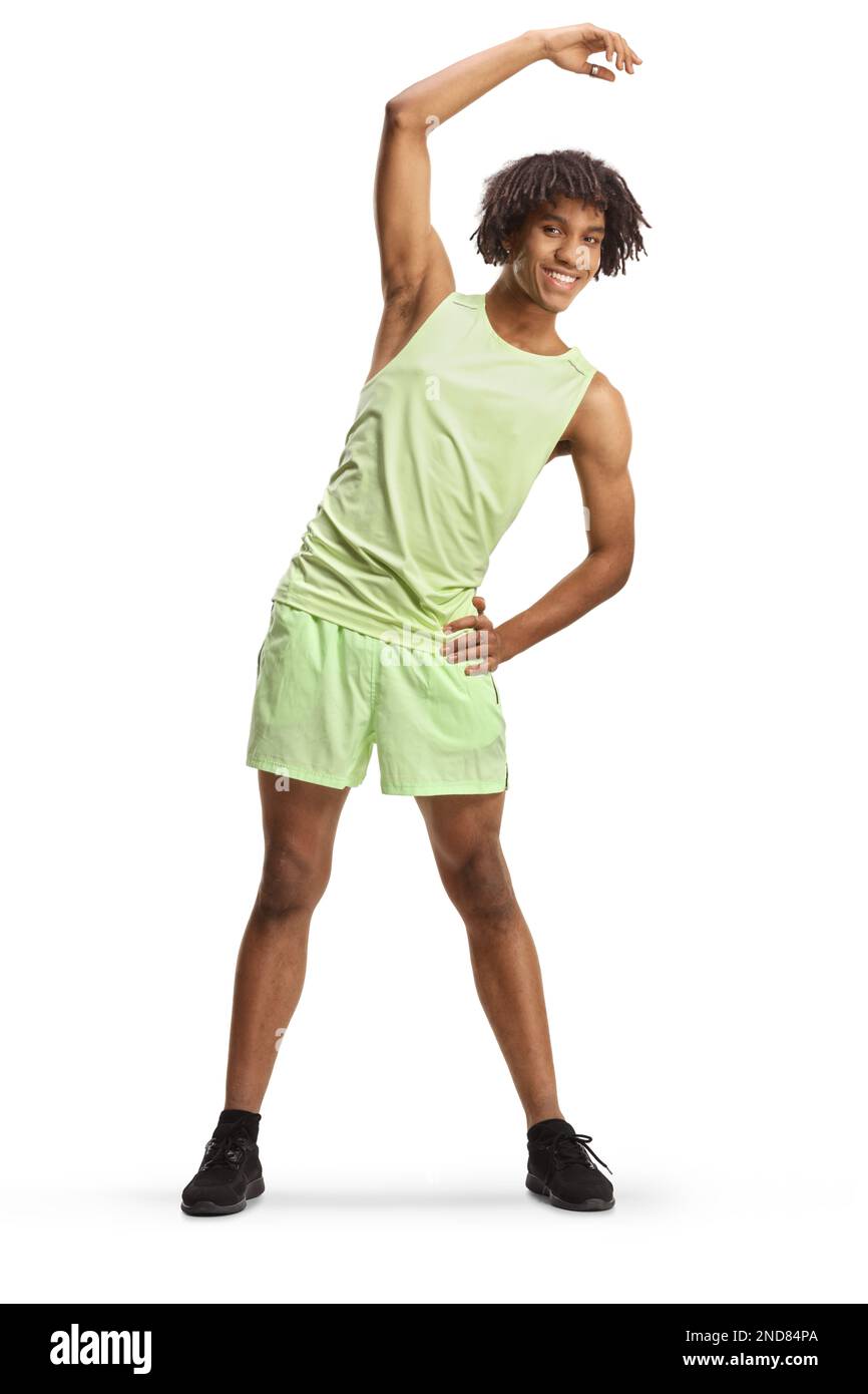Full length portrait of an african american young man in sportswear exercising isolated on white background Stock Photo