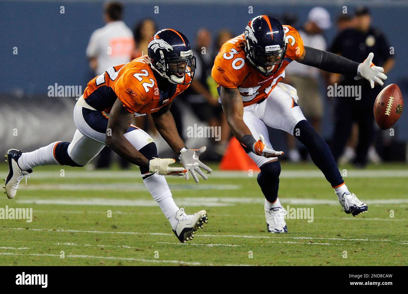 Denver Broncos cornerback Alphonso Smith, left, and safety David Bruton ...