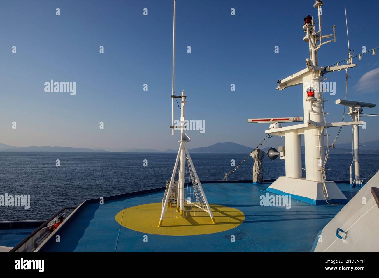 Across the Volos gulf in the morning, trip with ferry from Volos to Skiathos, islands hopping, Sporades voyage, Greece Stock Photo