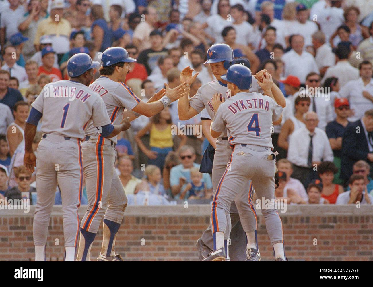 New York Mets' Mookie Wilson (1), Keith Hernandez, and Lenny