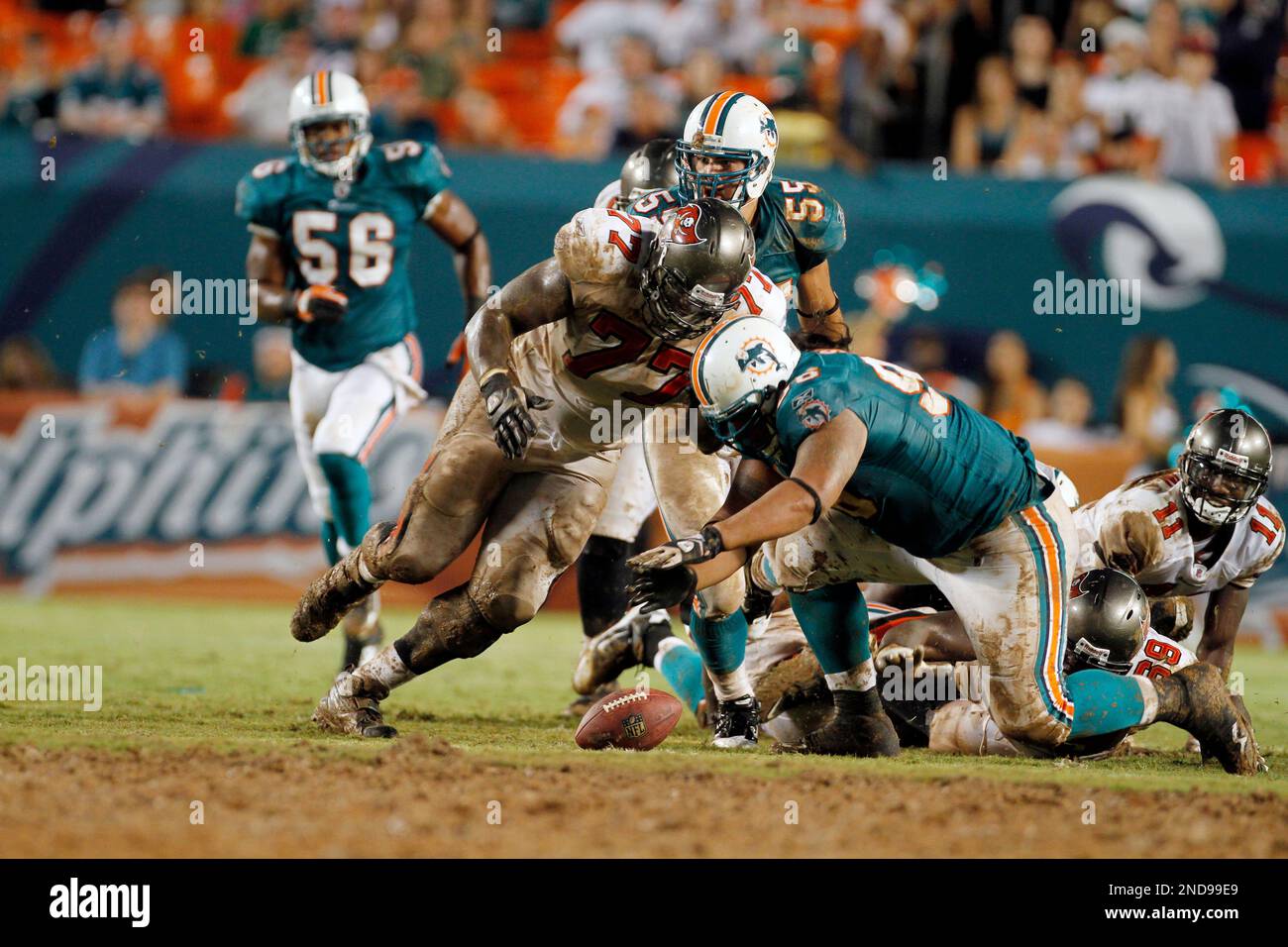 Tampa Bay Buccaneers' wide reciever Charles Lee (82) tries to elude a  tackle from Houston Texans' Marcus Coleman (42) during the Bucs' 16-3 win  against the Texans at Raymond James Stadium in