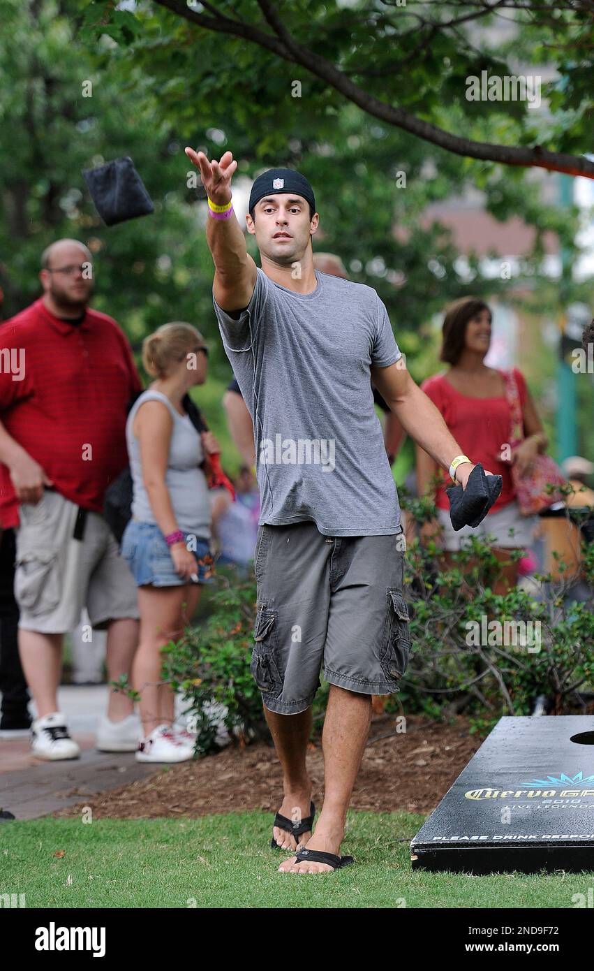 Clyde "Ace" Amerson from MTV's The Real World Paris tosses a sandbag
