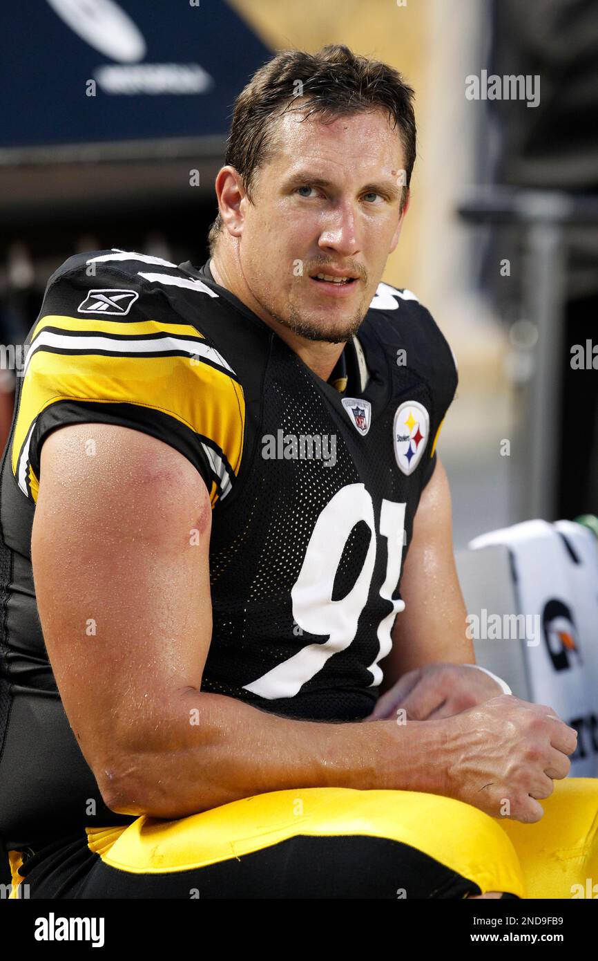 Pittsburgh Steelers defensive end Aaron Smith sits on the sidelines during  the first quarter of a preseason NFL football game against the Detroit Lions  in Pittsburgh, Saturday, Aug. 14, 2010. The Steelers