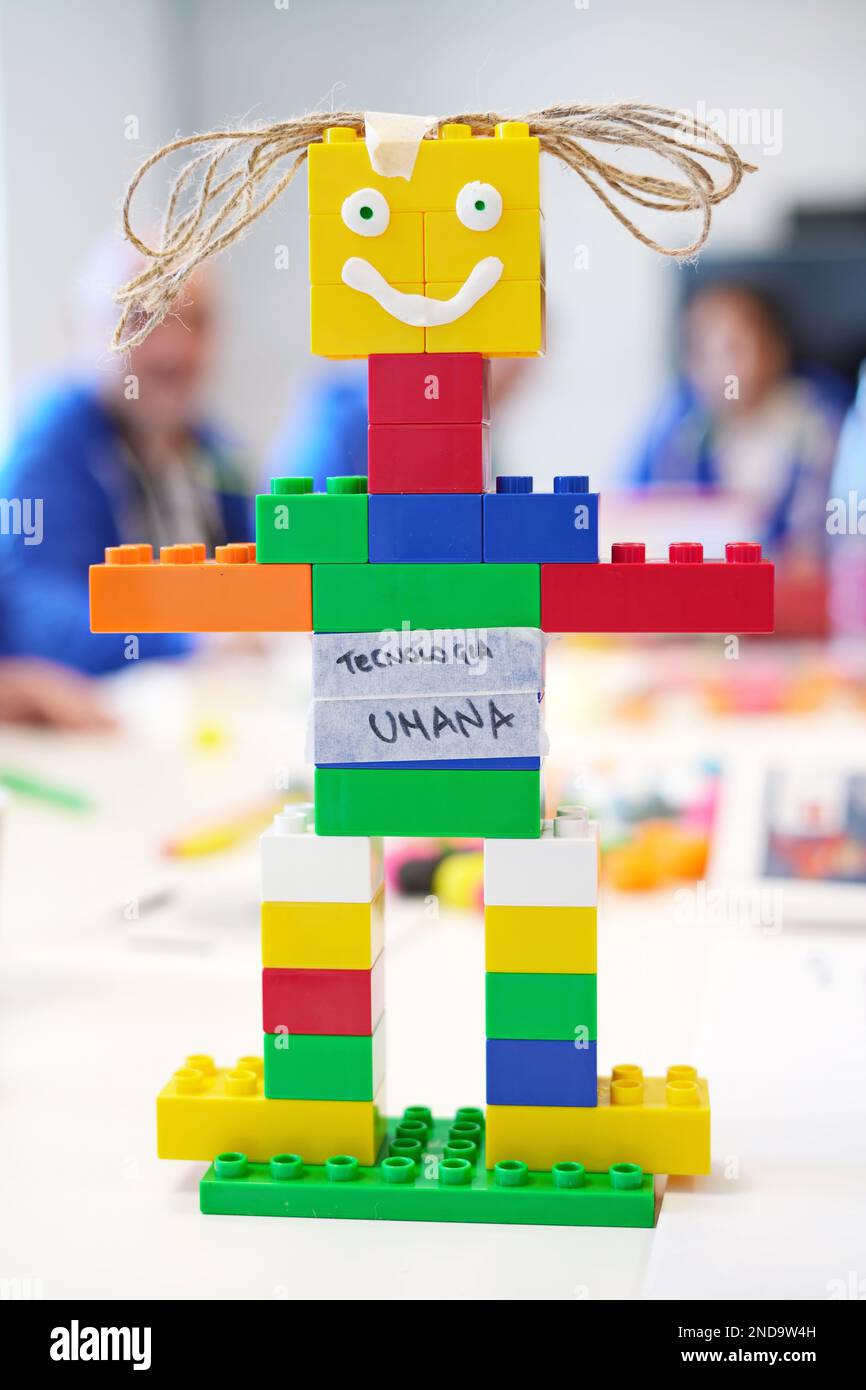 Smiling Toy robot made from toy plastic colorful blocks Stock Photo