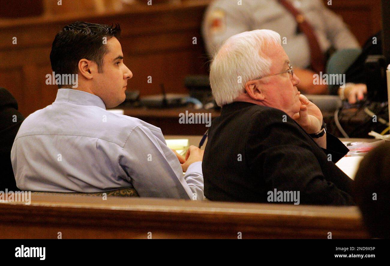 Former Marine Cesar Laurean, left, and his attorney Dick McNeil listen