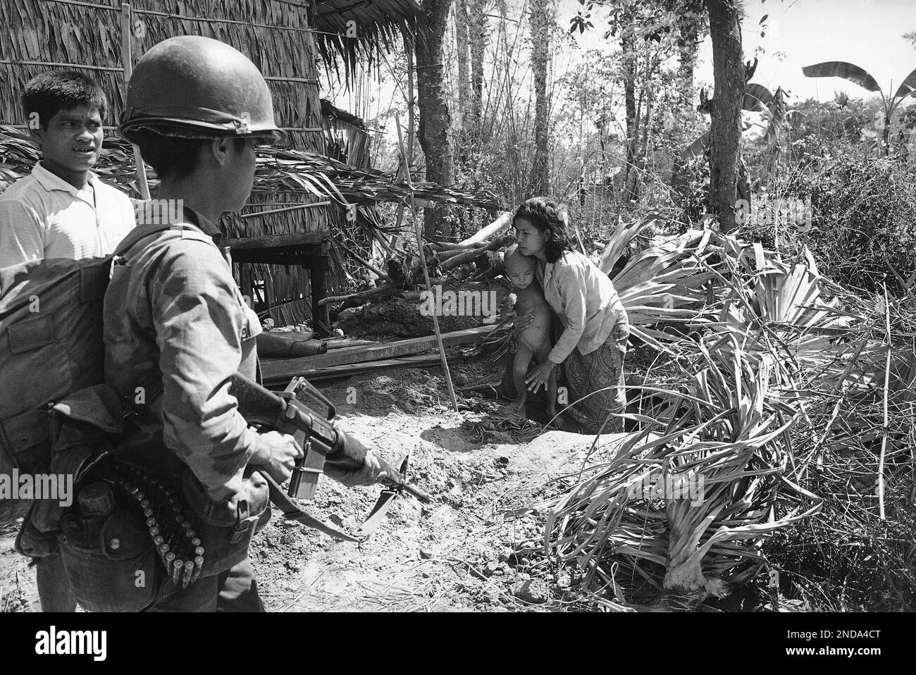 Vietnam Ranger Rto A South Vietnamese ranger keeps his finger on the trigger of his weapon ...