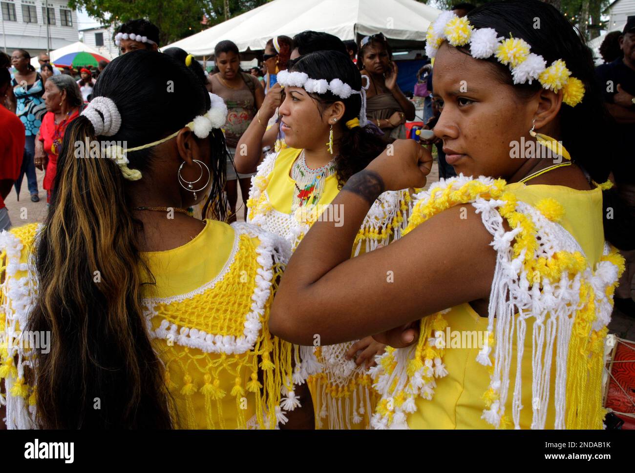 Dancers of an Amerindian indigenous group from Suriname wait to perform