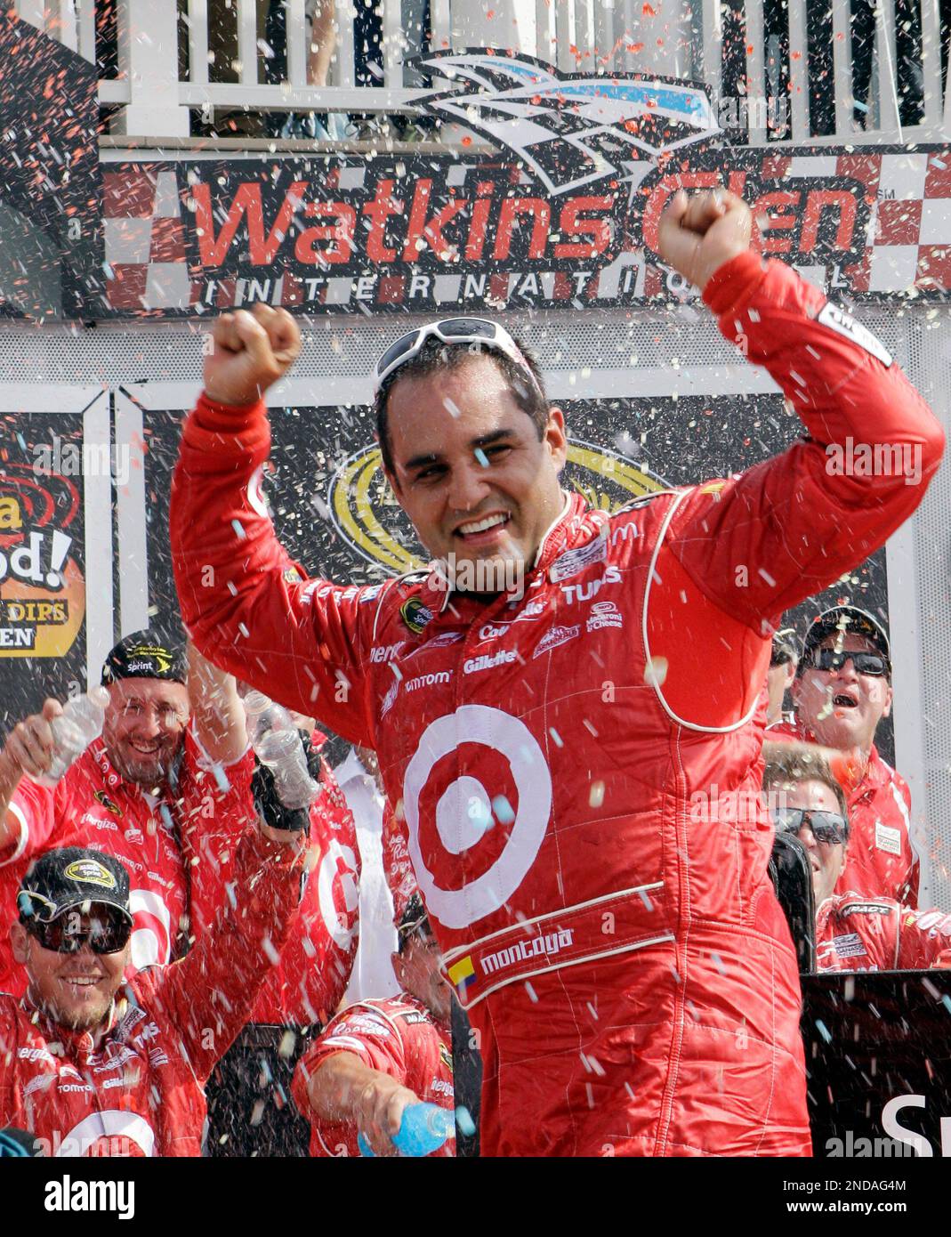 Juan Pablo Montoya celebrates winning the NASCAR Sprint Cup Series