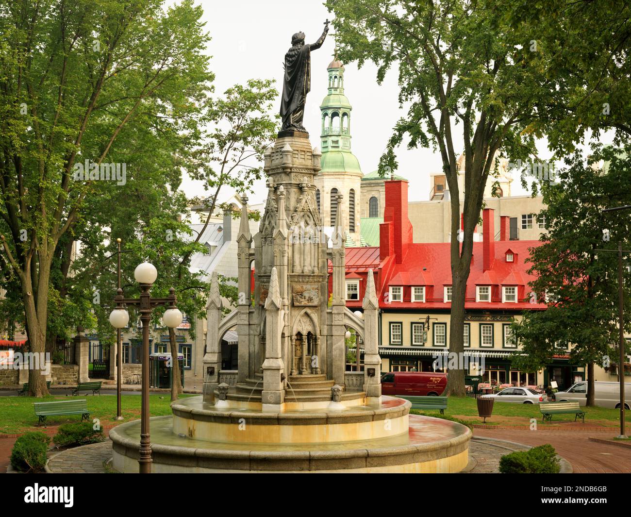 Canada Quebec Quebec City Place d'Armes, Gothic fountain on which stands the Faith Monument (monument de la Foi) Stock Photo