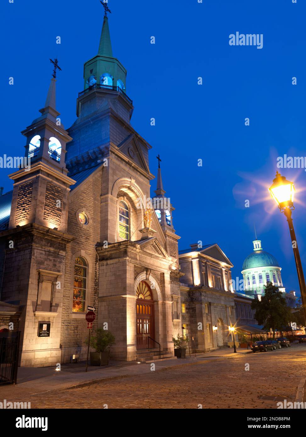 Canada, Quebec, Montreal, Notre-Dame-de-Bon-Secours Chapel in the district of Old Montreal, built in 1771. As viewed illuminated at dusk. Stock Photo