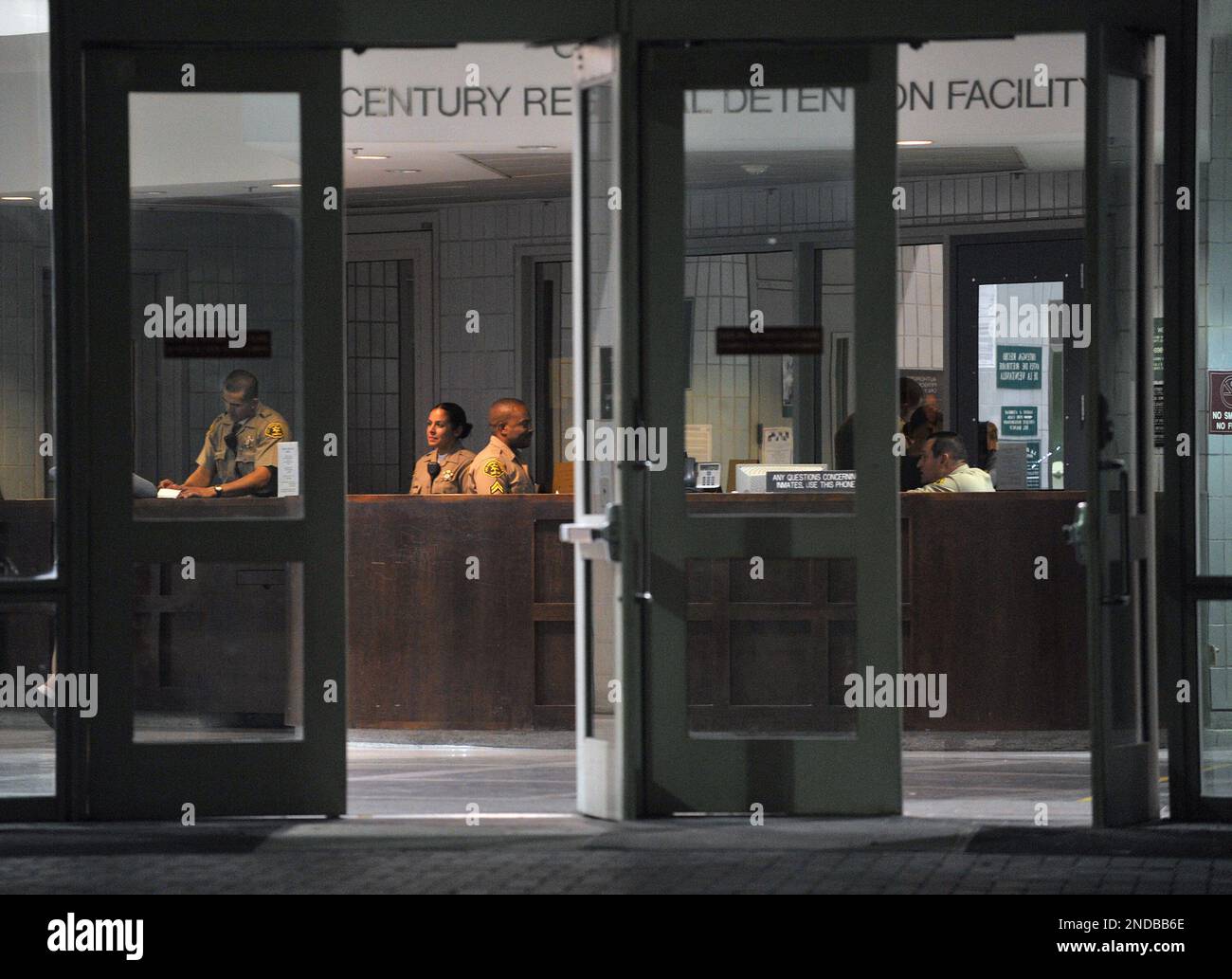 Los Angeles County sheriffs can be seen inside the main entrance at the ...