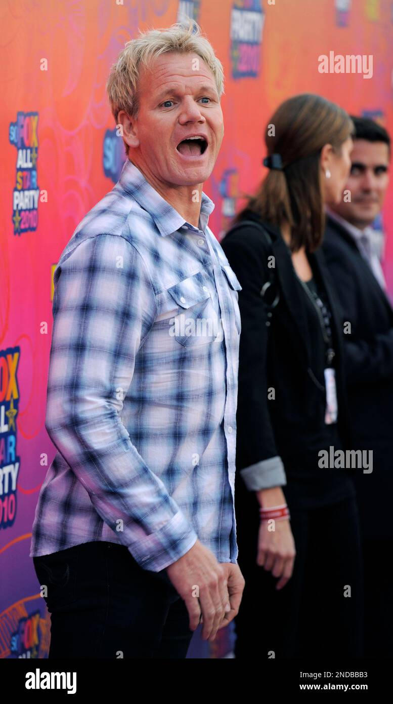 British chef Gordon Ramsay reacts to photographers as he arrives at the ...
