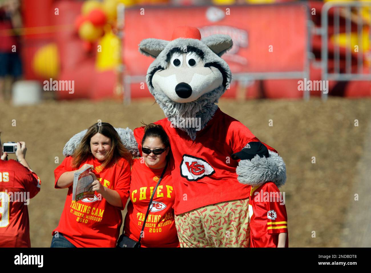 Kansas City Chiefs mascot, KC Wolf, poses for a photograph with fans