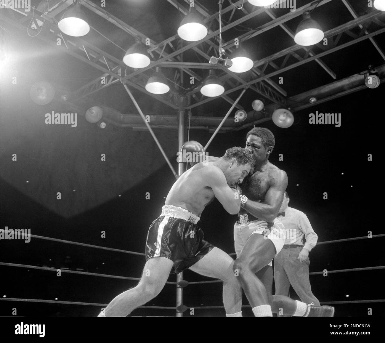 Heavyweight Champion Rocky Marciano Ducks Under Right Hand Thrown By heavyweight-champion-rocky-marciano-ducks-under-right-hand-thrown-by