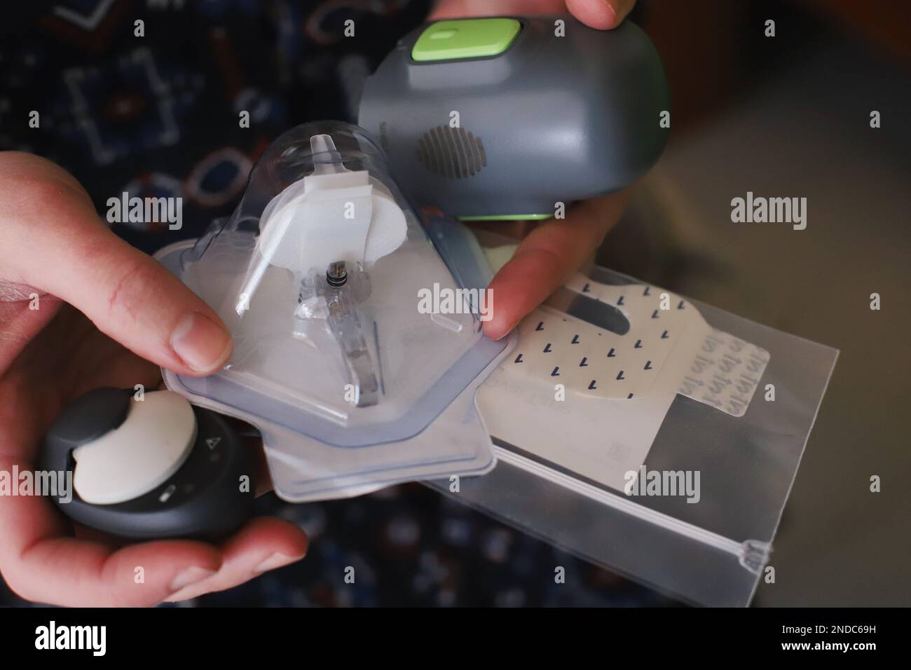 Supplies needed to replace a blood glucose sensor Stock Photo - Alamy